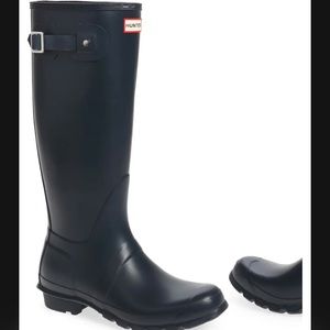 Black tall hunter boots